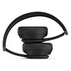 Beats Solo 4 on-ear wireless headphones in Matt Black, folded with the ear cups stacked