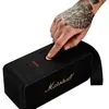Marshall Middleton portable Bluetooth speaker in Black and Brass, pressing the control knob