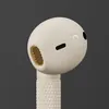 Marshall Minor IV true wireless earbuds in Cream, close-up of the right earbud