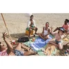 JBL Boombox 2 portable Bluetooth speaker in Black, at a beach picnic