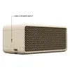 Marshall Emberton III portable Bluetooth speaker in Cream, side view with the USB-C charging port