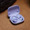 Beats Powerbeats Pro 2 true wireless earbuds in Hyper Purple, earbuds in the open charging case