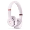 Beats Solo 4 on-ear wireless headphones in Cloud Pink, angled view from the other side