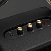 Marshall Tufton portable Bluetooth speaker in Black and Brass, close-up of the brass control knobs and battery indicator
