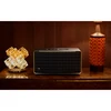 JBL Authentics 500 smart home speaker in Black, on a wooden sideboard