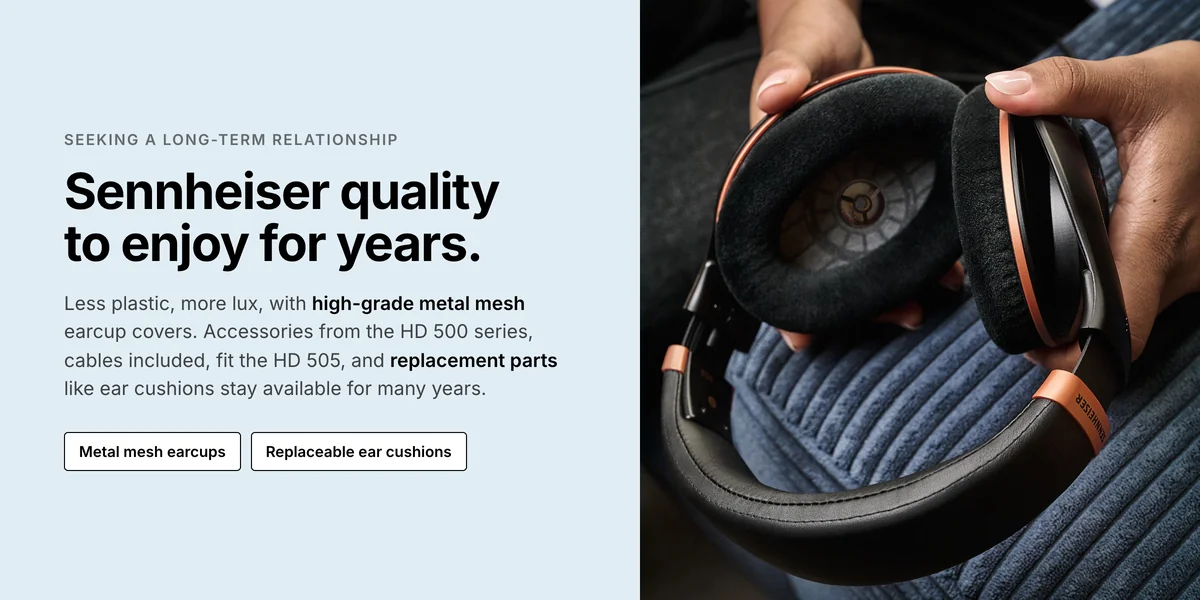 Hands holding Sennheiser HD 505 Copper, metal mesh earcups and replaceable ear cushions