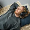 Sennheiser HD 560S open-back audiophile headphones in Black, worn while relaxing at home